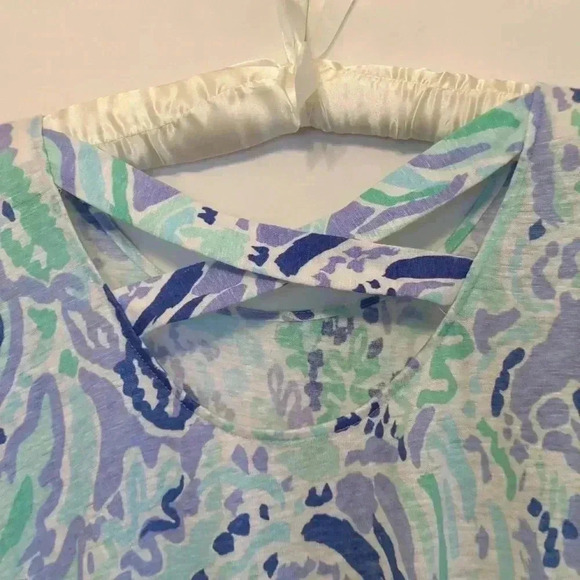 Lilly Pulitzer dress with unique hemline fringe and crisscross in back. Medium - Picture 6 of 6